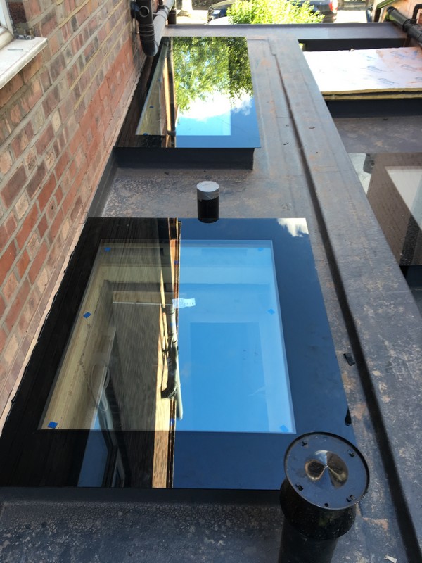 Multiple flat roof skylights on extension in Whitechapel